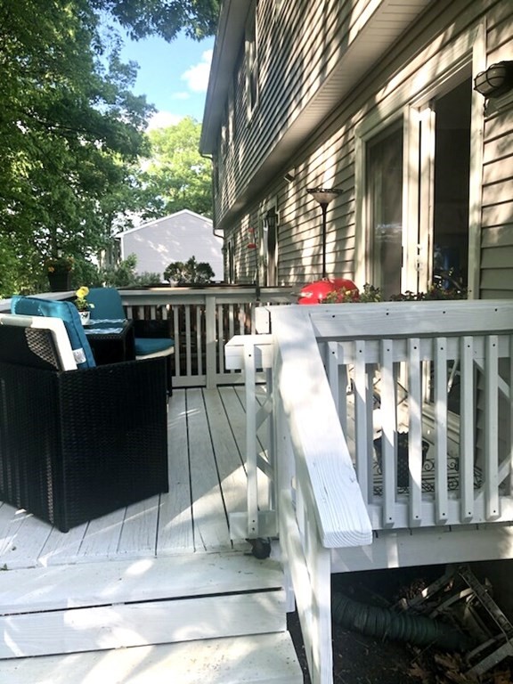 270 Sunderland Road, Unit 95 Worcester, MA 01604 - Photo 3 of 17 a view of a balcony with wooden floor
