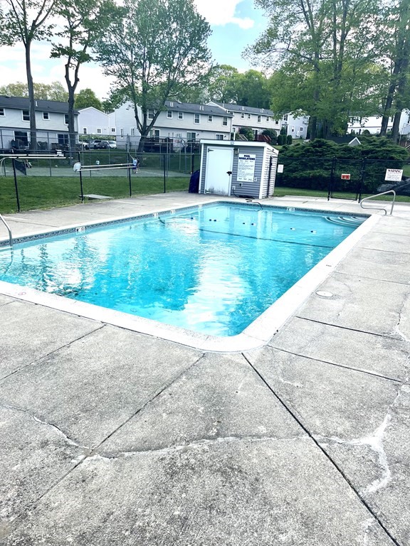 270 Sunderland Road, Unit 95 Worcester, MA 01604 - Photo 5 of 17 a view of a swimming pool with a patio