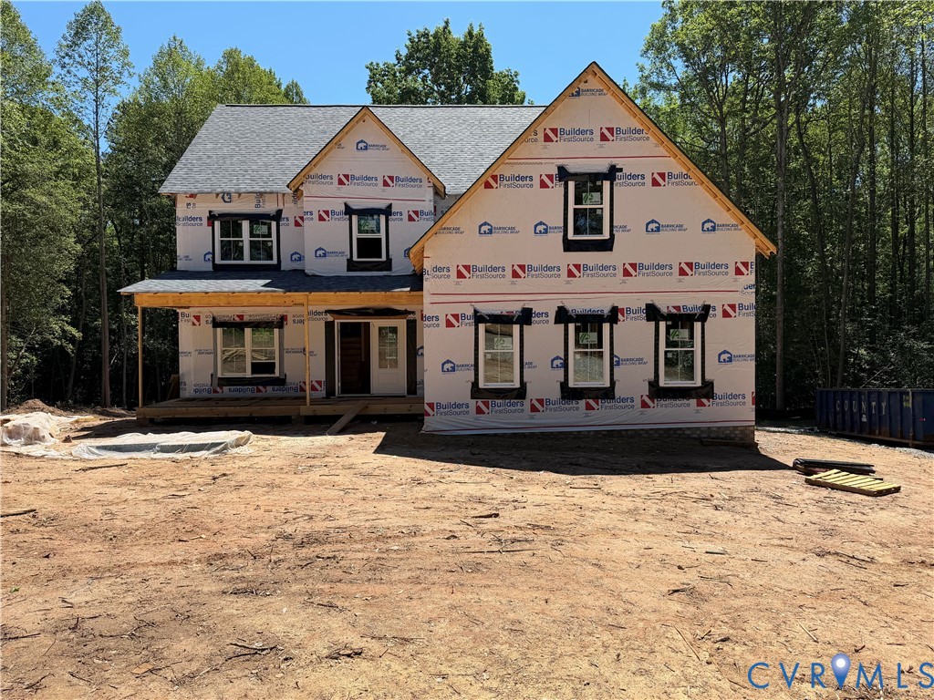 15426 Beaver Dam Road Montpelier, VA 23192 - Photo 1 of 19 a front view of a house with a yard
