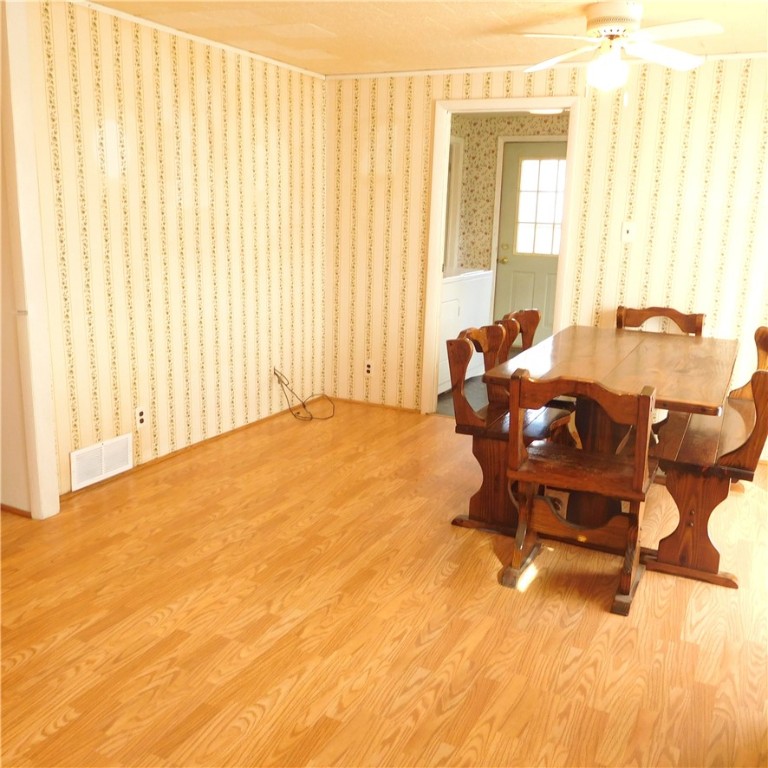 16091 Carr Road Kendall, NY 14476 - Photo 7 of 32 Updated wood look flooring. Plenty of room for a l