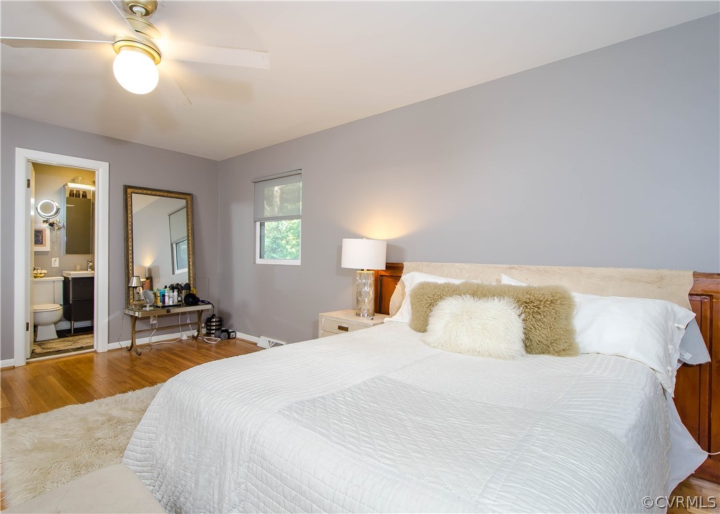 7638 Redbud Road Richmond, VA 23235 - Photo 18 of 32 The master bedroom has hardwood flooring, walk-in
