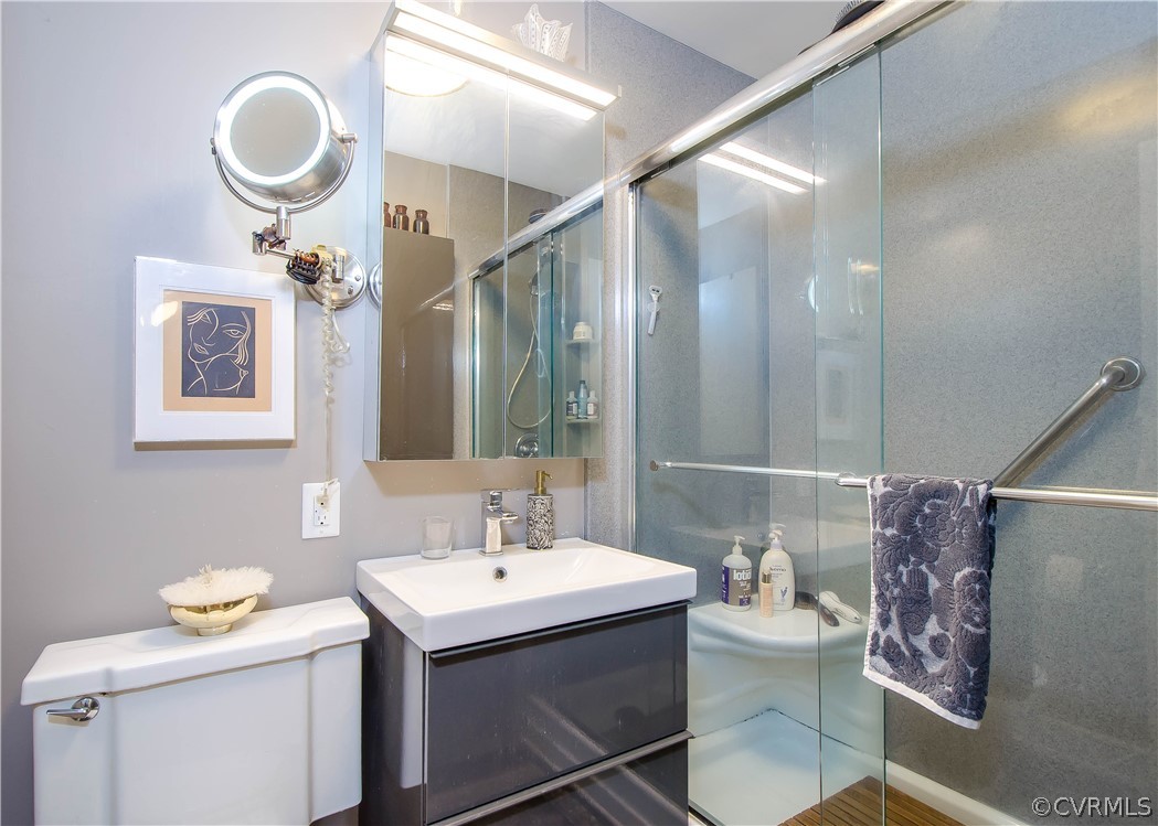 7638 Redbud Road Richmond, VA 23235 - Photo 20 of 32 The master bathroom has tile flooring, walk-in sho