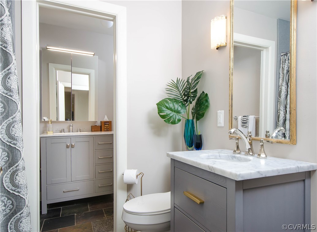 7638 Redbud Road Richmond, VA 23235 - Photo 22 of 32 The hall bathroom has a tub and shower, marble top