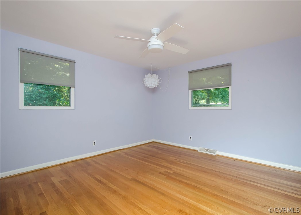 7638 Redbud Road Richmond, VA 23235 - Photo 24 of 32 The third bedroom has hardwood flooring, closet, a