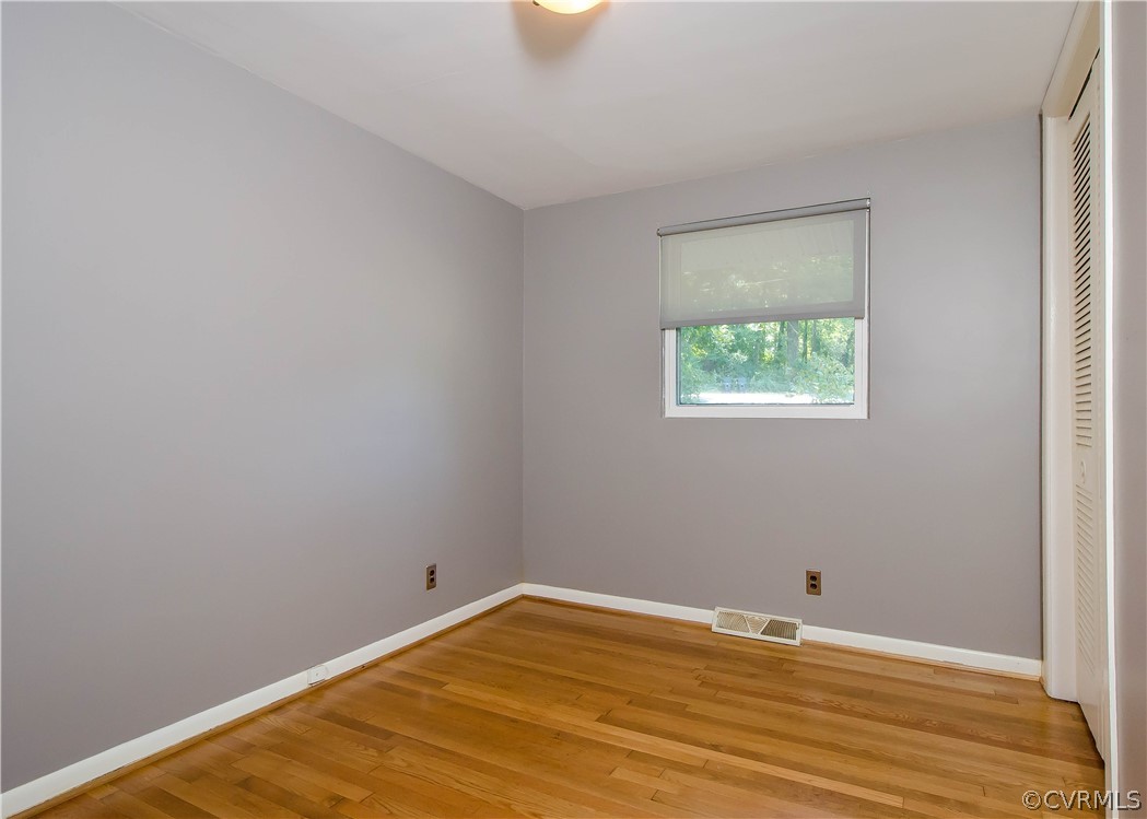 7638 Redbud Road Richmond, VA 23235 - Photo 25 of 32 The fourth bedroom has hardwood flooring, closet,