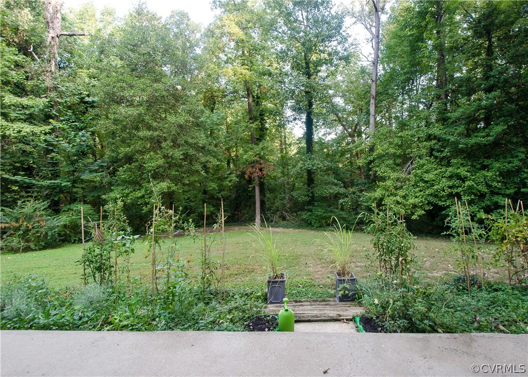 7638 Redbud Road Richmond, VA 23235 - Photo 29 of 32 The tiered flower beds have vegetable gardens, and