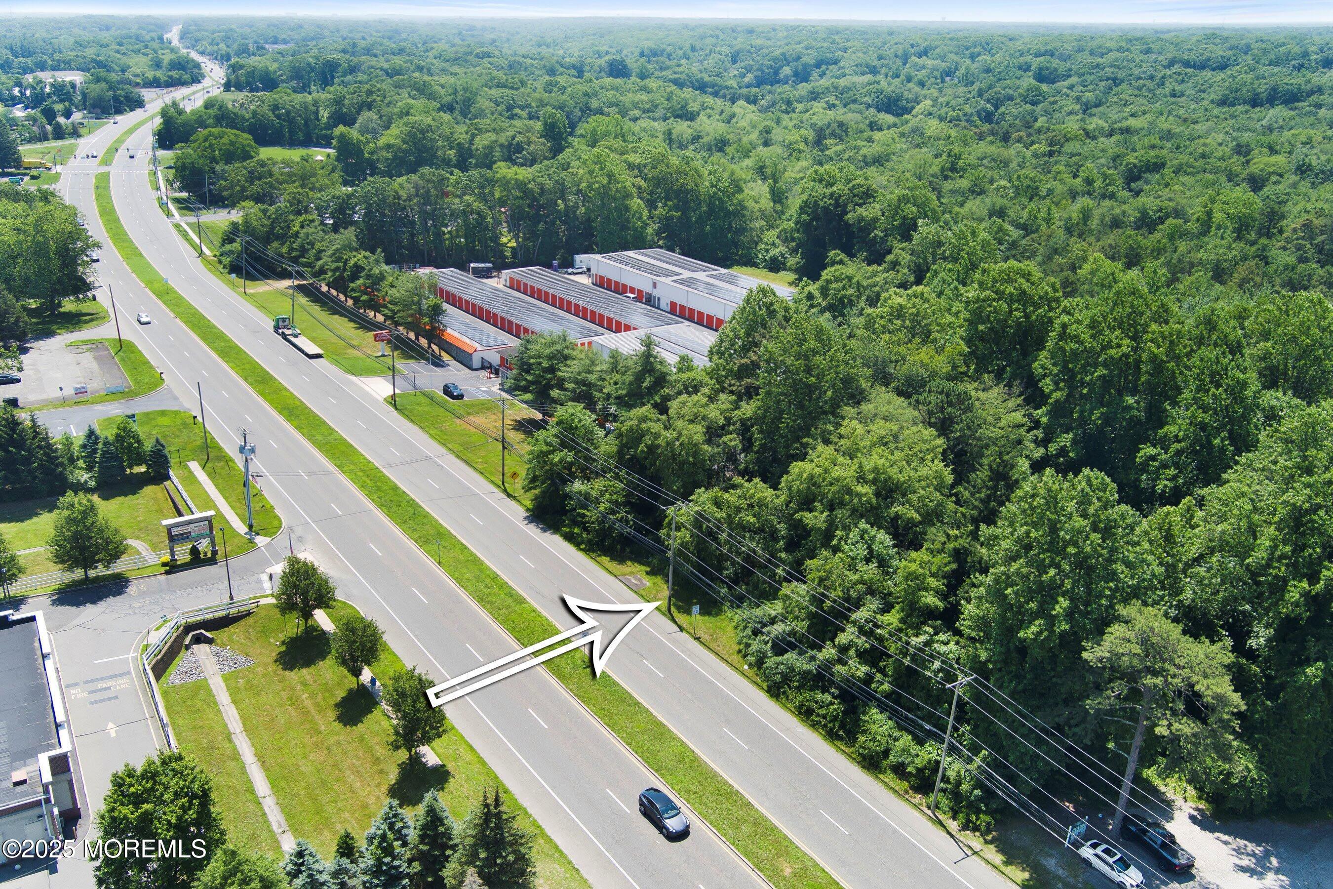 185 North County Line Road Jackson, NJ 08527 - Photo 12 of 22 a view of a balcony with a yard