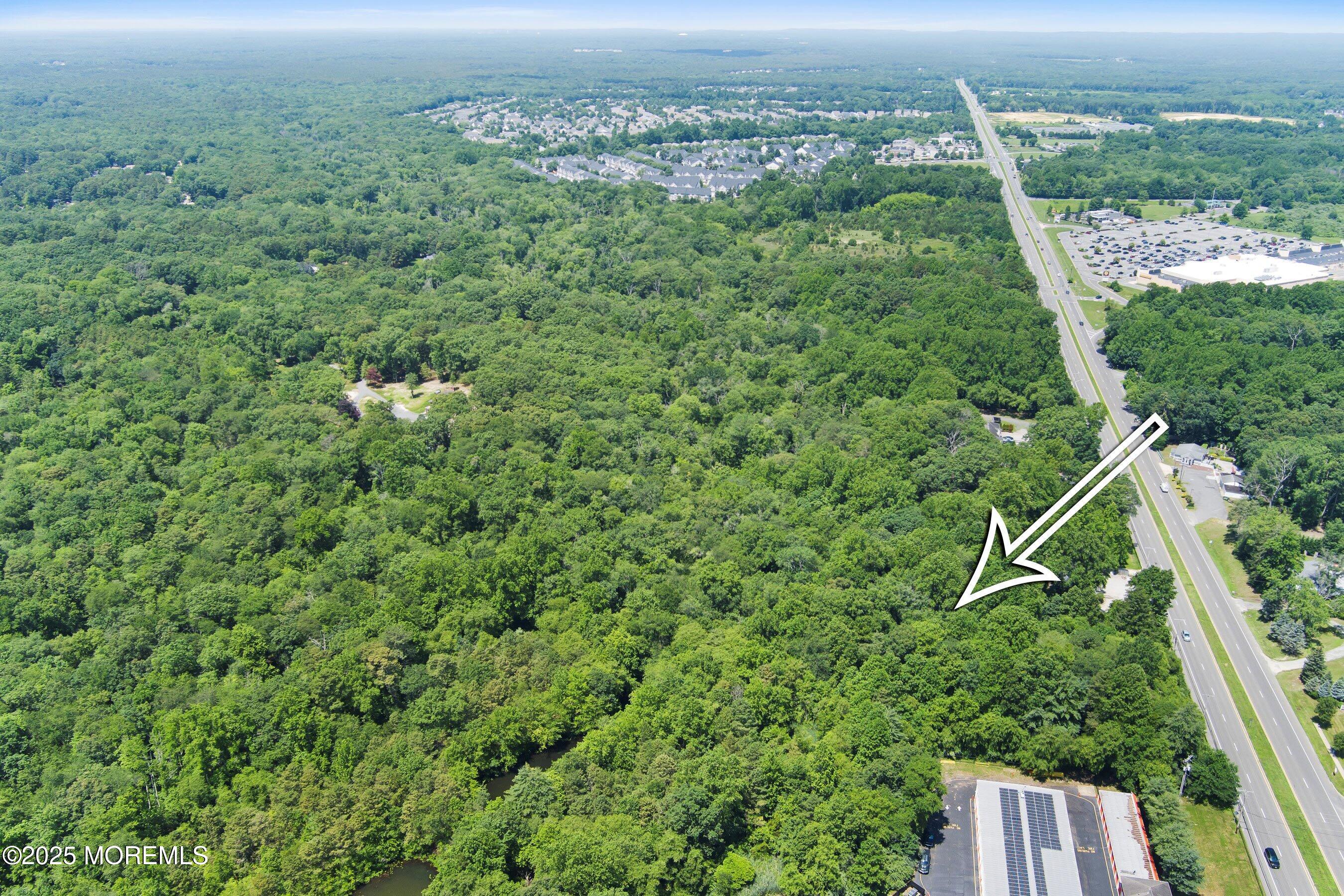 185 North County Line Road Jackson, NJ 08527 - Photo 18 of 22 a view of a yard with an outdoor space