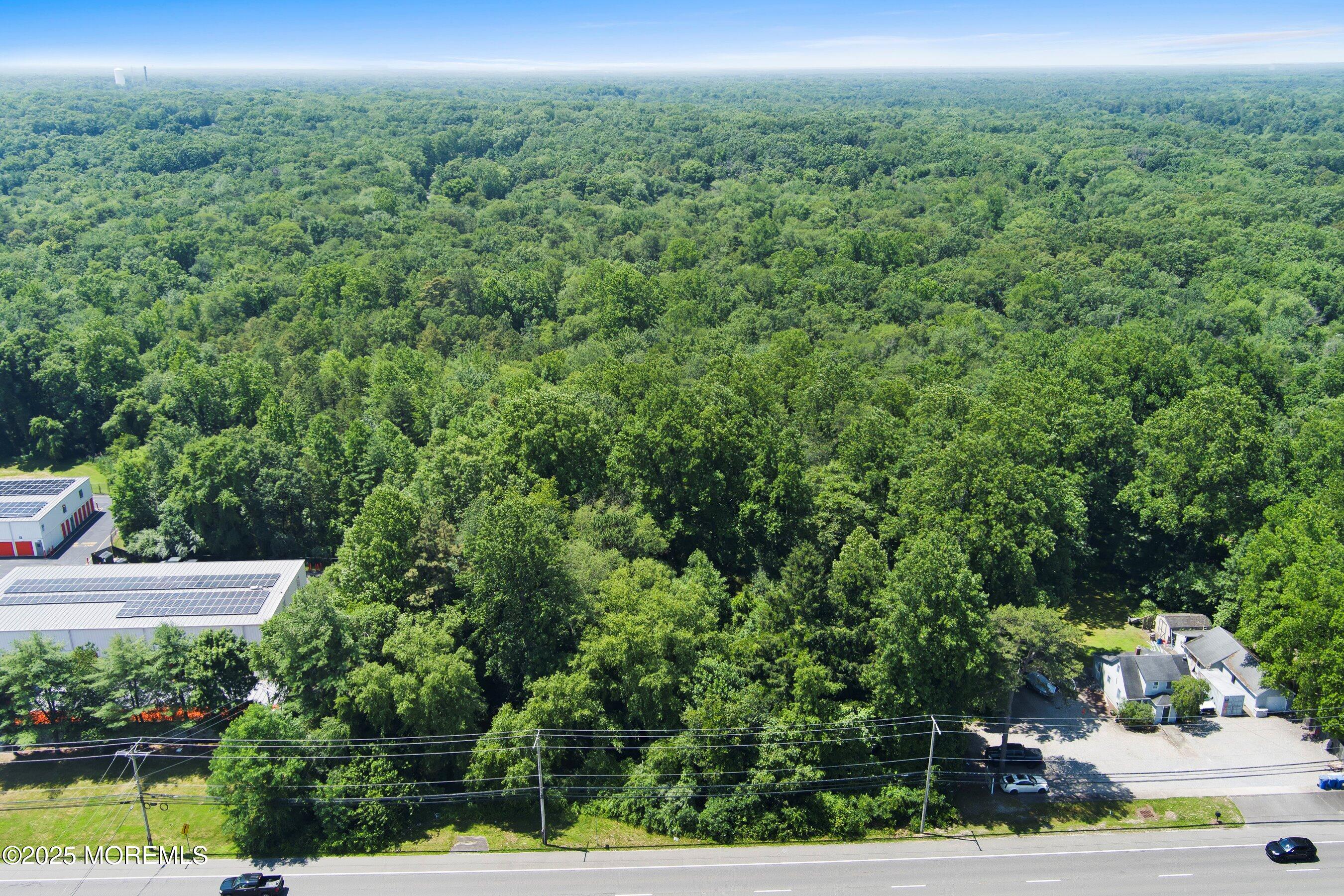 185 North County Line Road Jackson, NJ 08527 - Photo 5 of 22 an aerial view of a houses with a yard