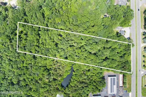 a view of a yard from a balcony