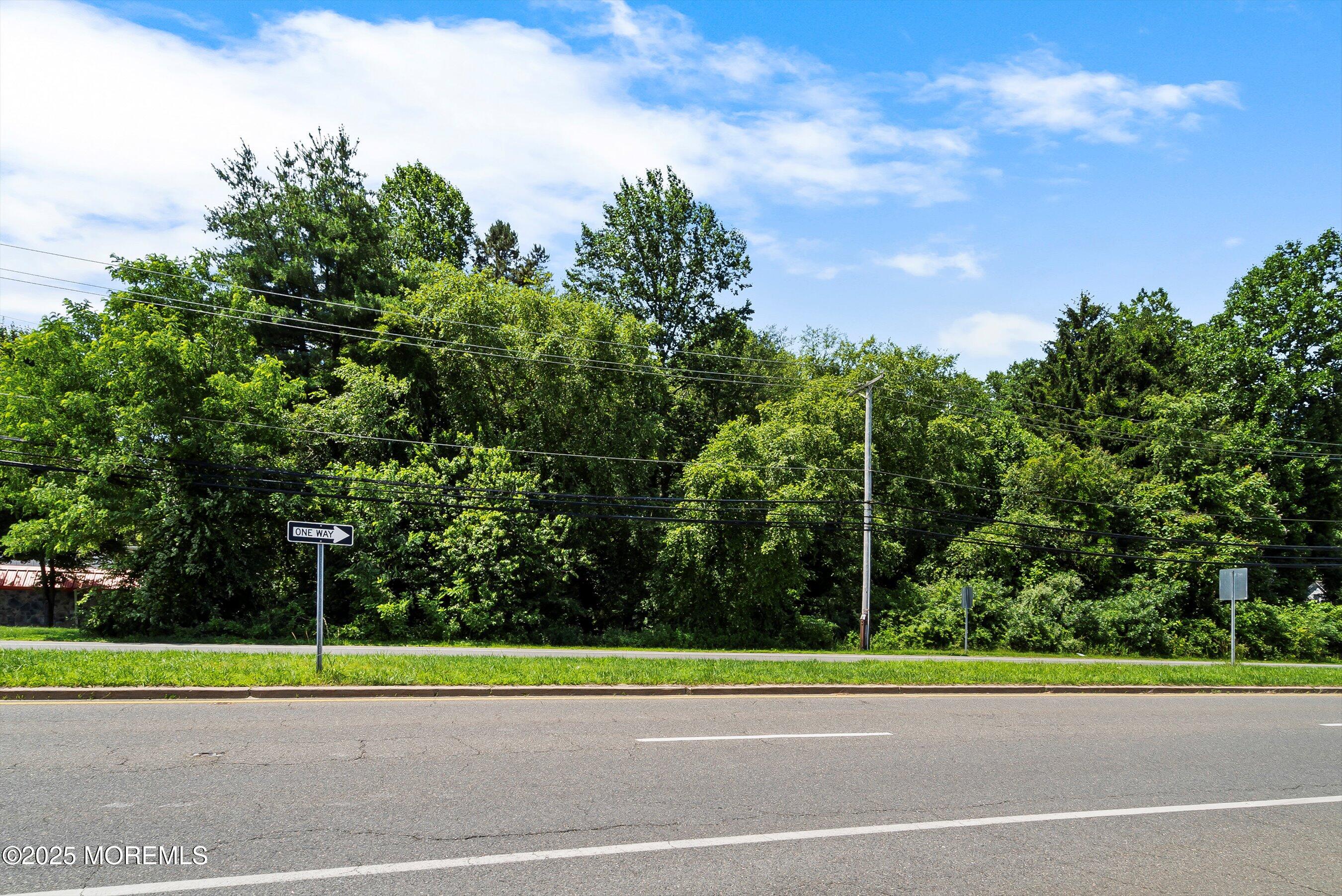 185 North County Line Road Jackson, NJ 08527 - Photo 9 of 22 a view of a yard in front of a house