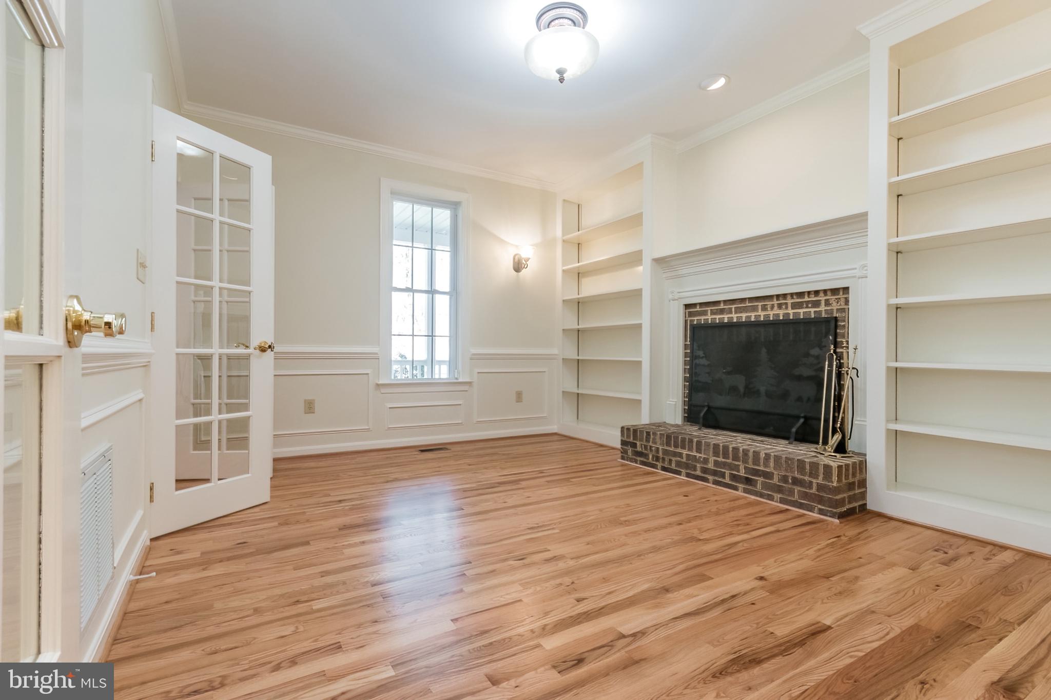 976 Hunting Ridge Road Winchester, VA 22603 - Photo 60 of 120 Library w/built ins & wood burning fireplace