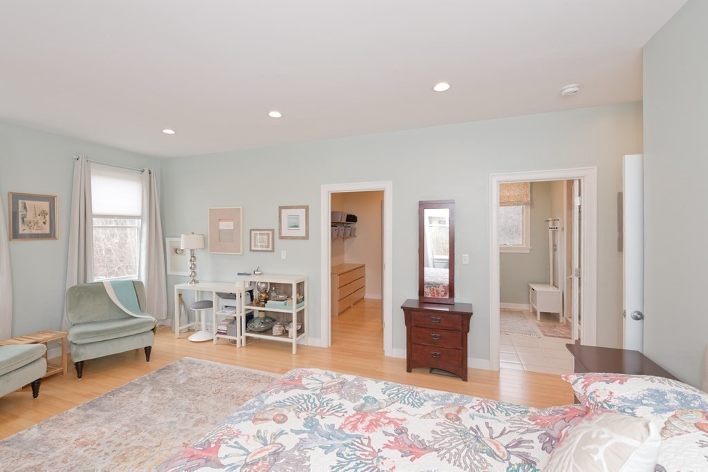 12 Cider Mill Road Stow, MA 01775 - Photo 15 of 42 a bedroom with furniture and a wooden floor