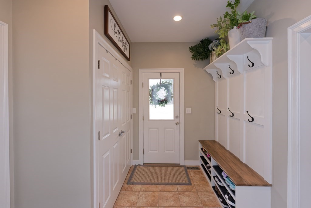 12 Cider Mill Road Stow, MA 01775 - Photo 19 of 42 a view of a hallway with entryway