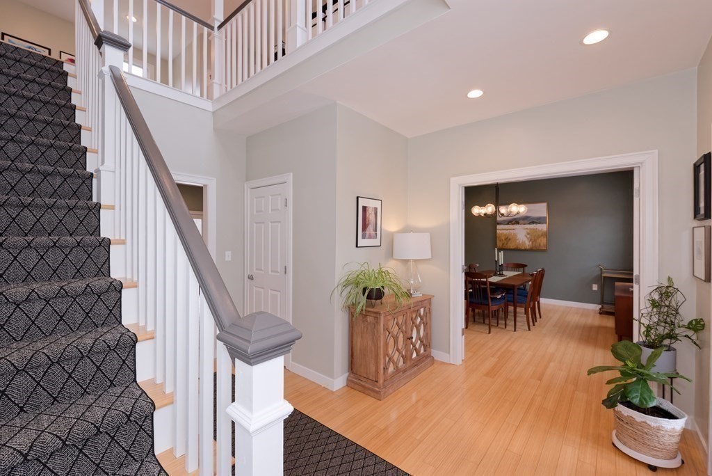 12 Cider Mill Road Stow, MA 01775 - Photo 20 of 42 a view of an entryway and livingroom with furniture