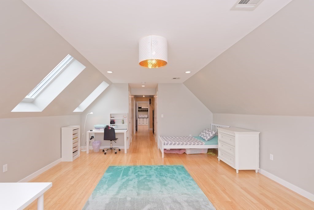 12 Cider Mill Road Stow, MA 01775 - Photo 29 of 42 a view of a living room and a livingroom with furniture wooden floor