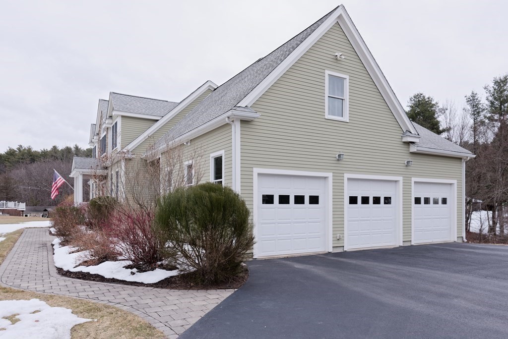 12 Cider Mill Road Stow, MA 01775 - Photo 39 of 42 a view of a house with backyard