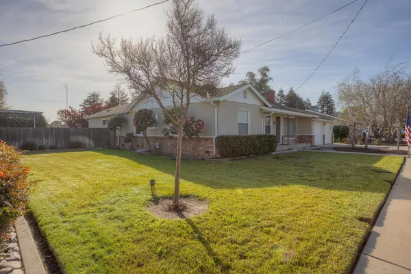 a view of a house with swimming pool