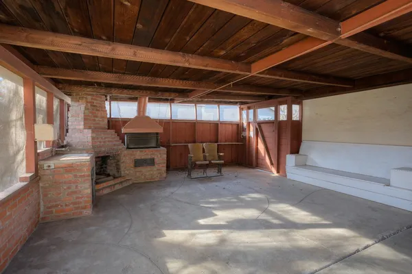 a view of a room with racks on the wall