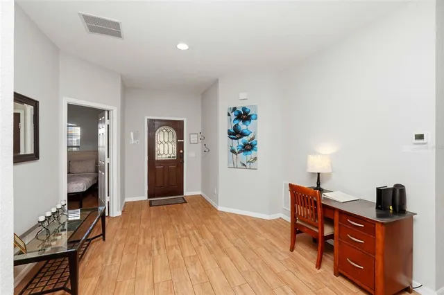 a workspace with furniture and window