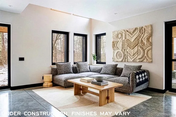 a living room with furniture and window