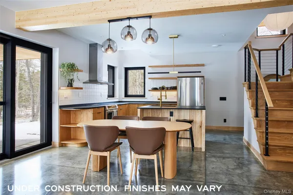 a view of a dining room with furniture