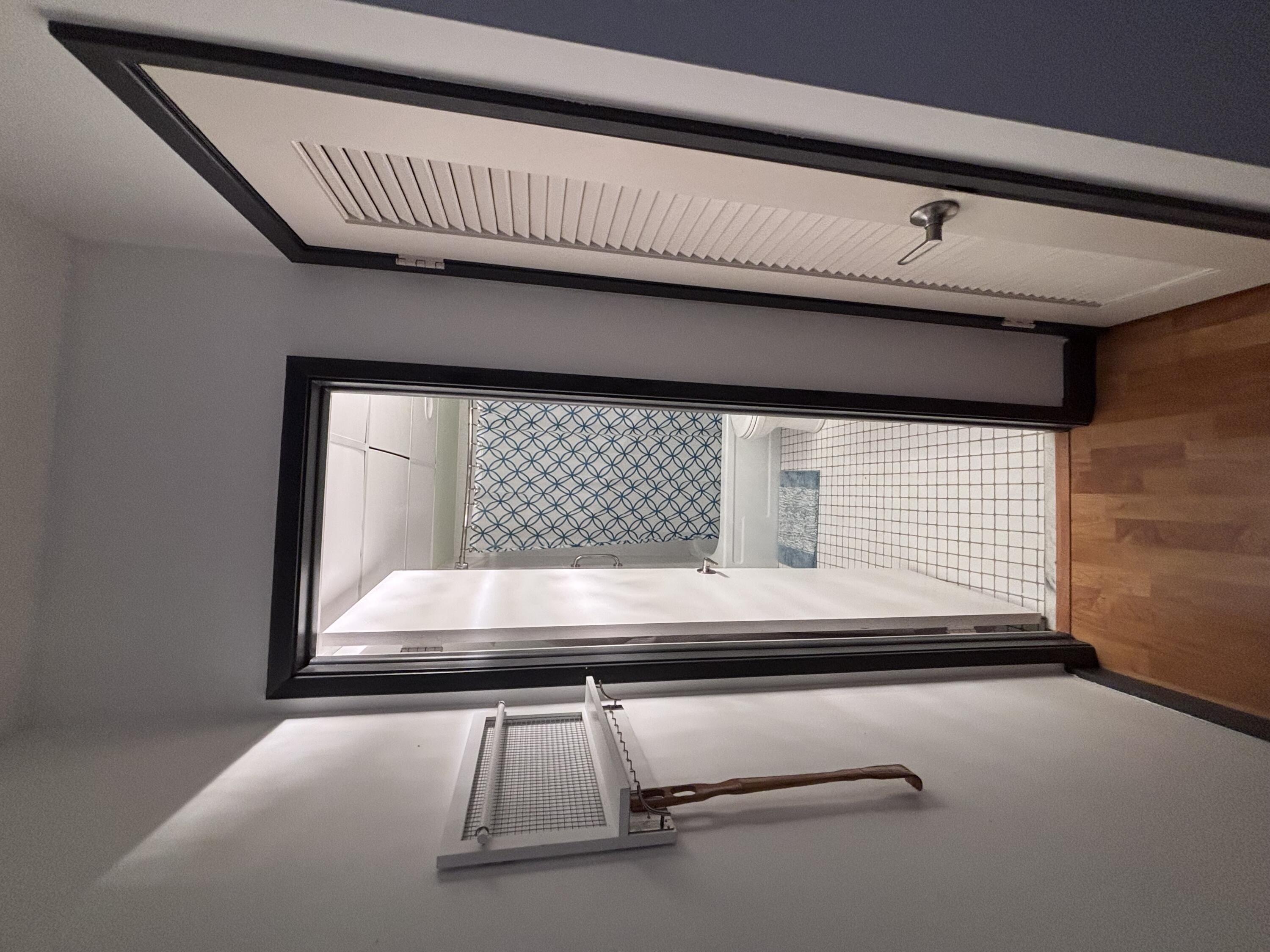 336 North Birch Road, Unit 8D Fort Lauderdale, FL 33304 - Photo 14 of 25 a view of kitchen with a window