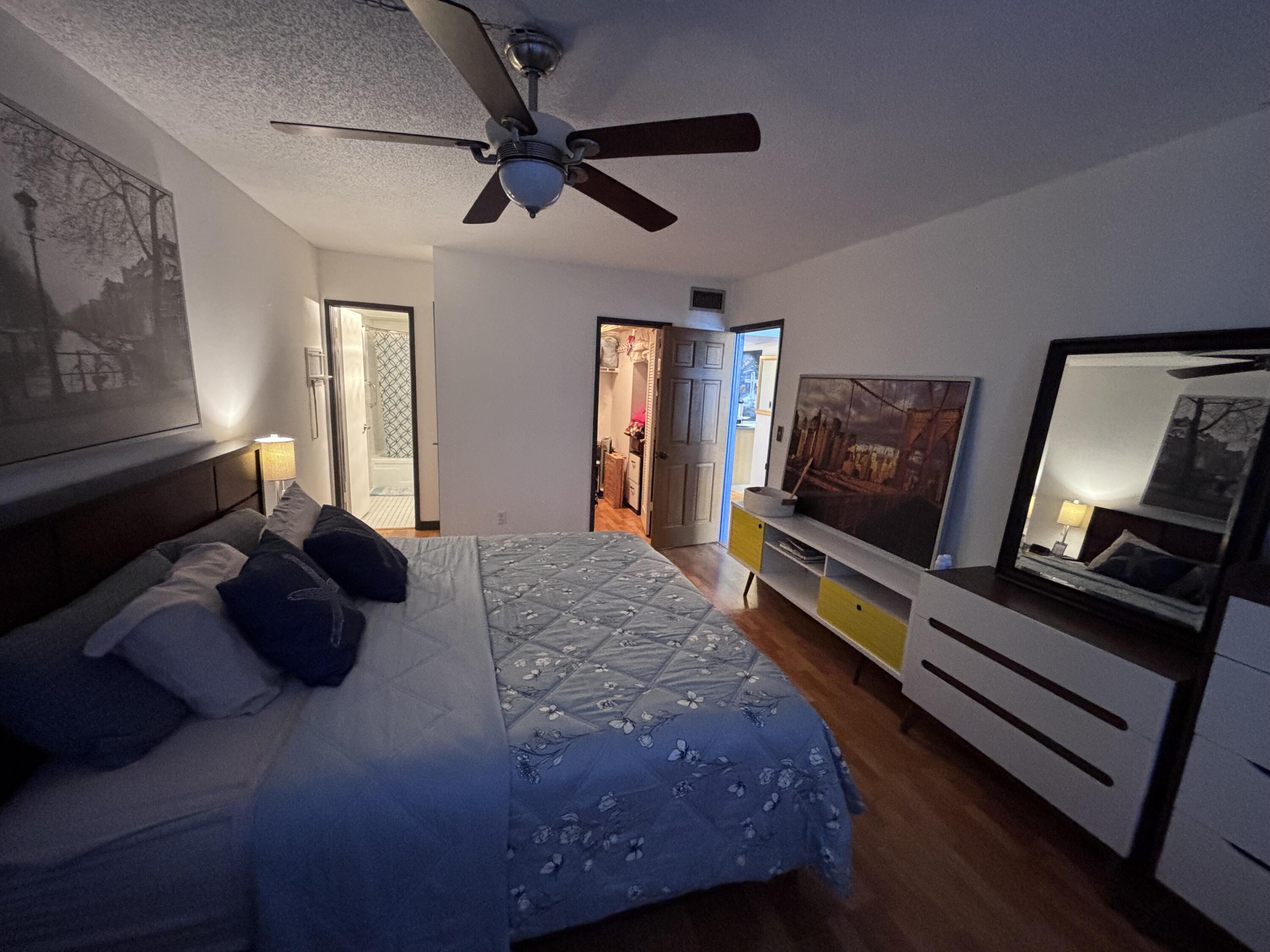 336 North Birch Road, Unit 8D Fort Lauderdale, FL 33304 - Photo 16 of 25 a living room with furniture and a flat screen tv