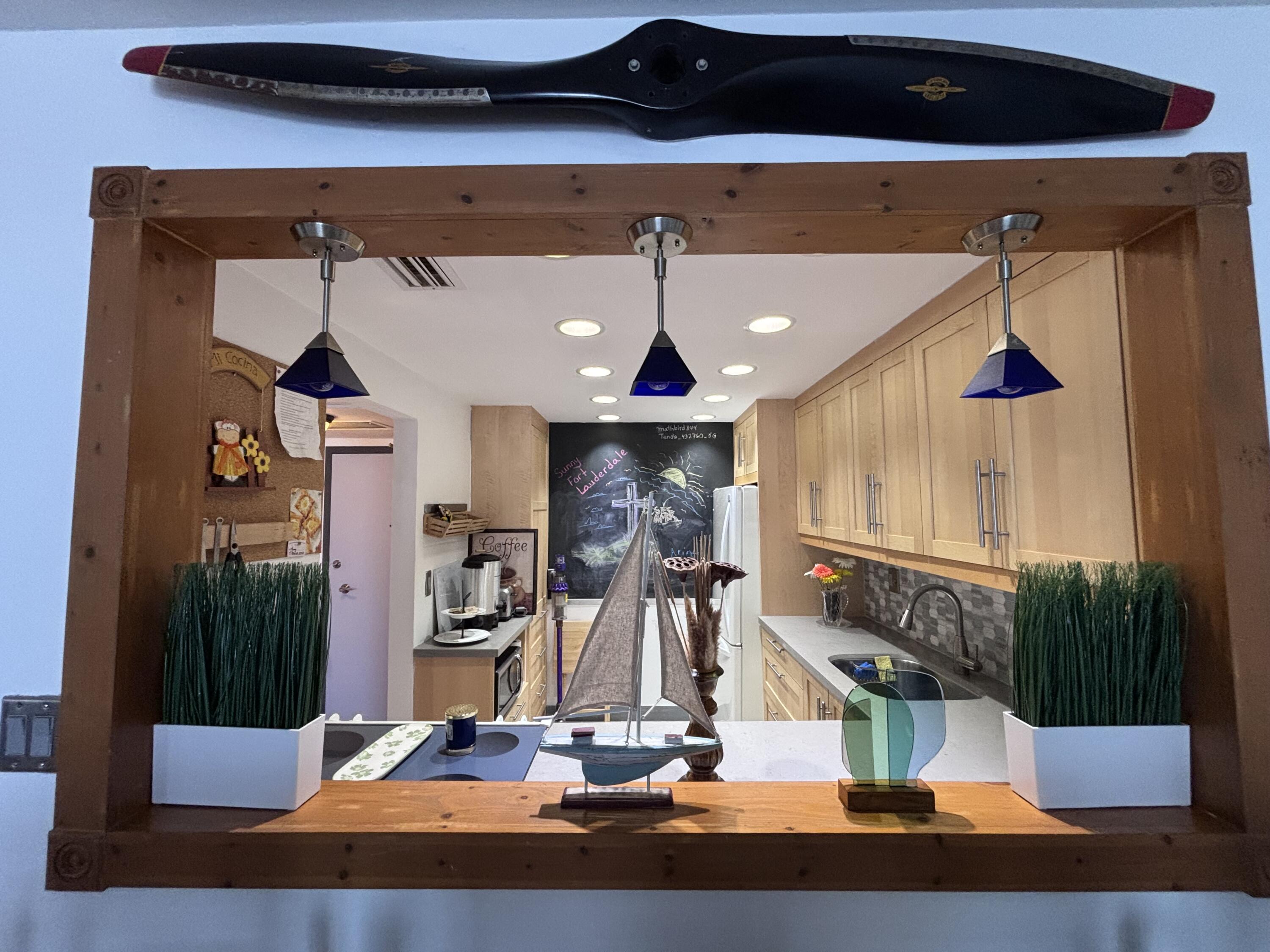 336 North Birch Road, Unit 8D Fort Lauderdale, FL 33304 - Photo 23 of 25 a room with lots of gym equipment