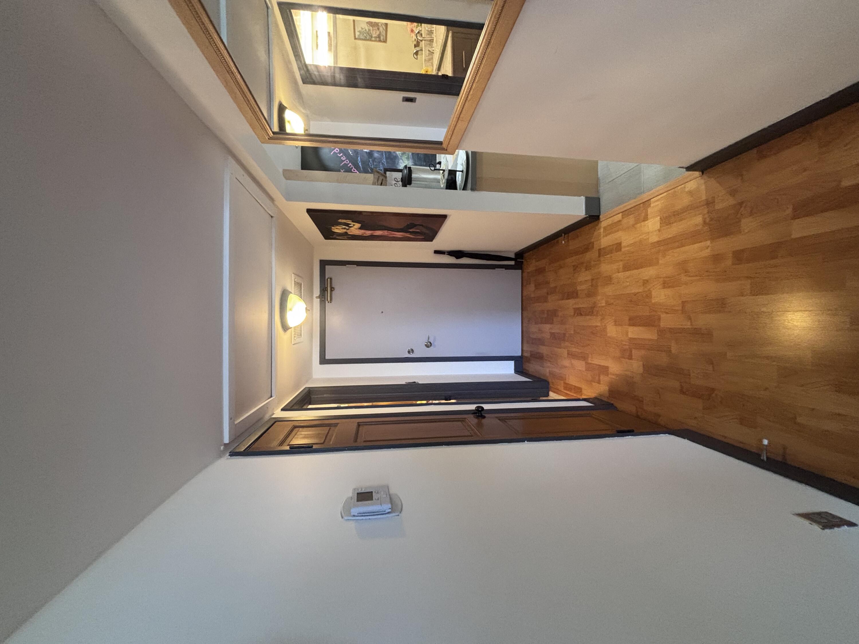 336 North Birch Road, Unit 8D Fort Lauderdale, FL 33304 - Photo 24 of 25 a view of an entryway with a wall