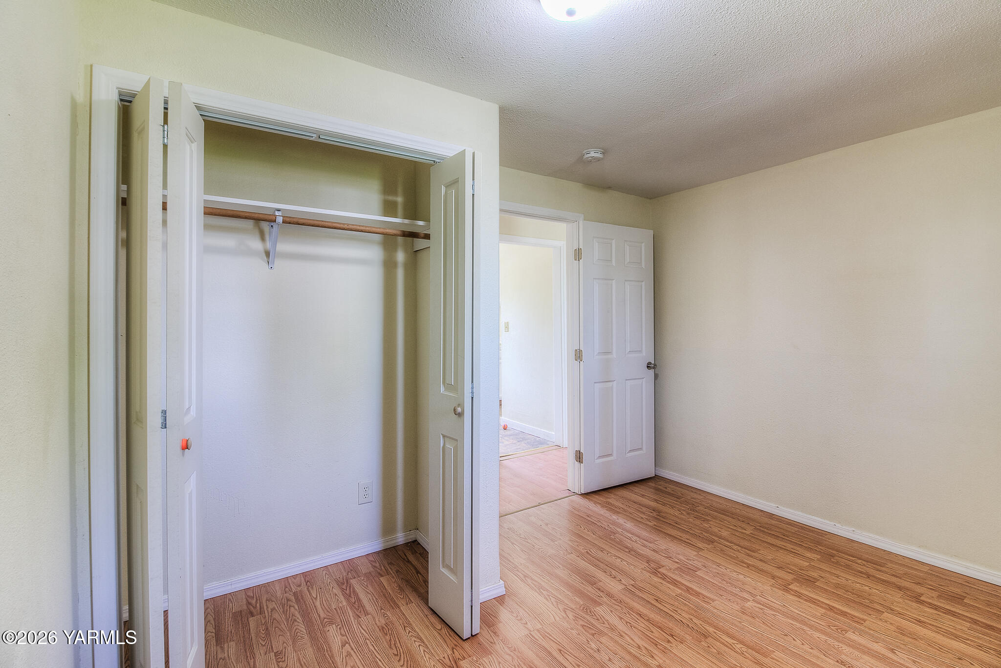 130 Green Giant Road Mabton, WA 98935 - Photo 13 of 34 a view of empty room with wooden floor