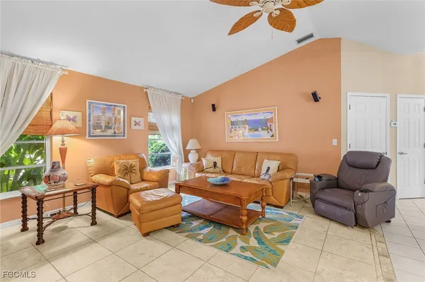 a living room with furniture and rug