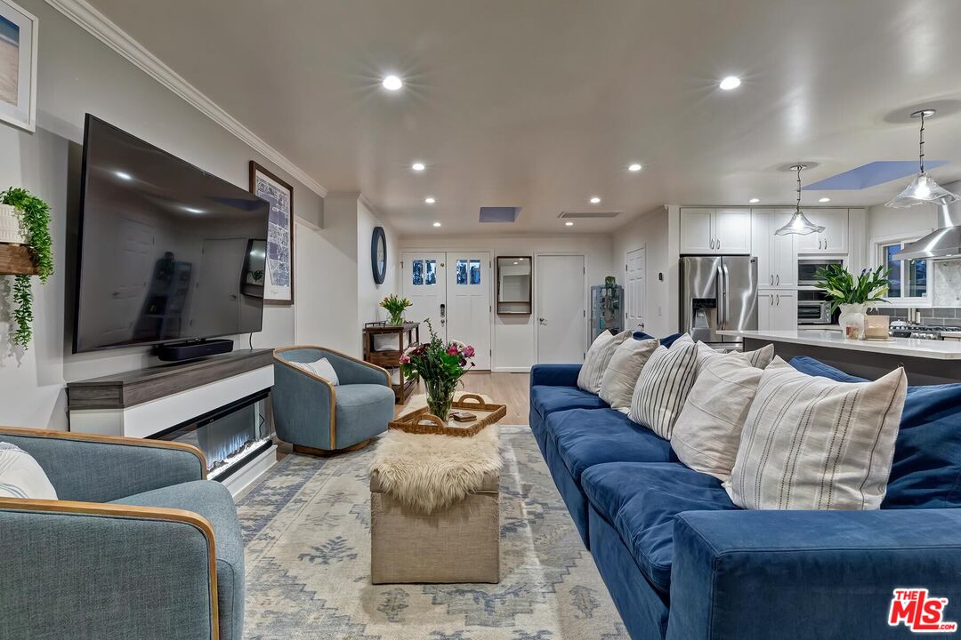 434 West Maple Avenue El Segundo, CA 90245 - Photo 9 of 29 a living room with furniture and a flat screen tv