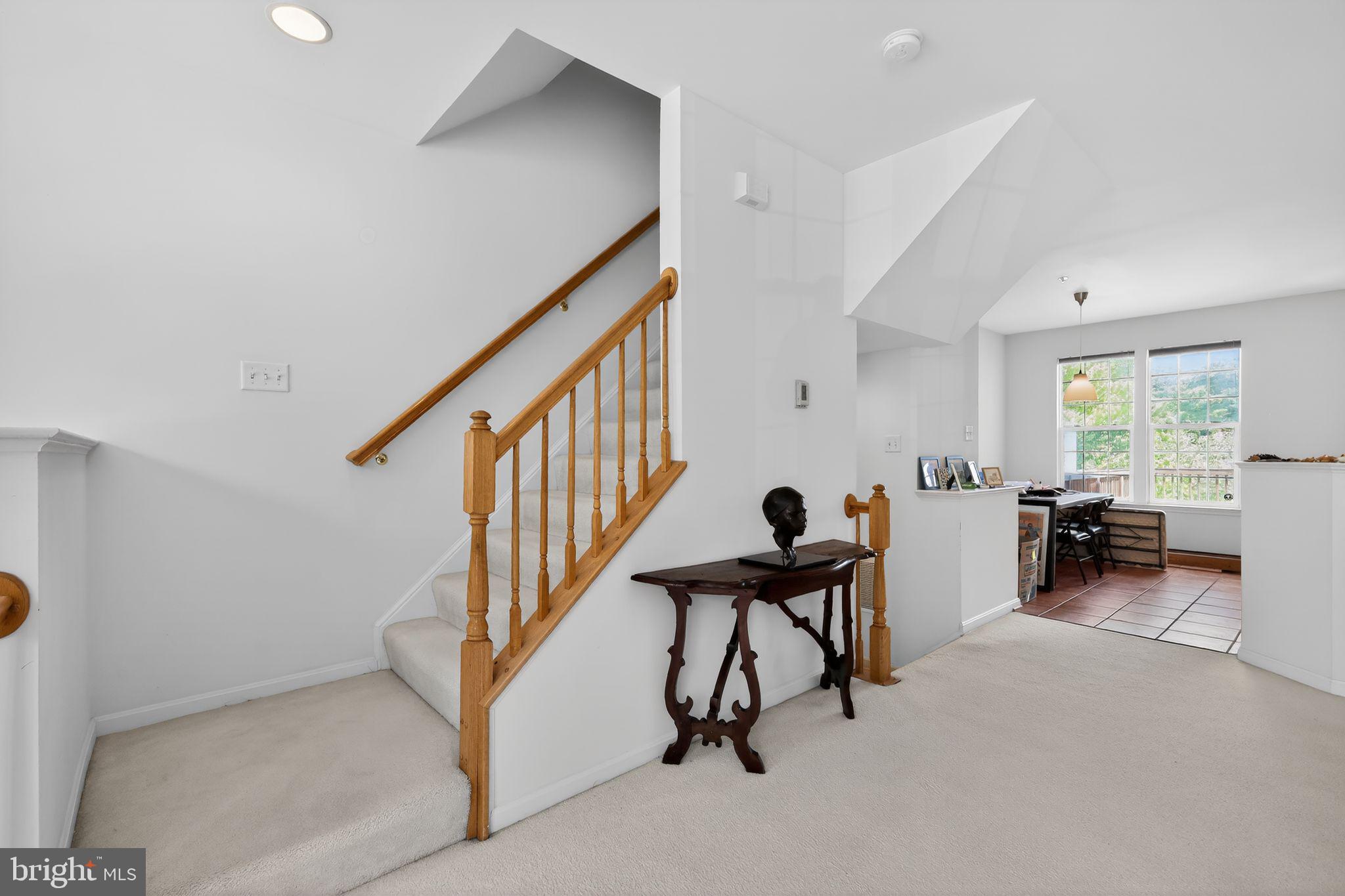 1034 Meandering Way Odenton, MD 21113 - Photo 19 of 30 a livingroom with furniture and stairs