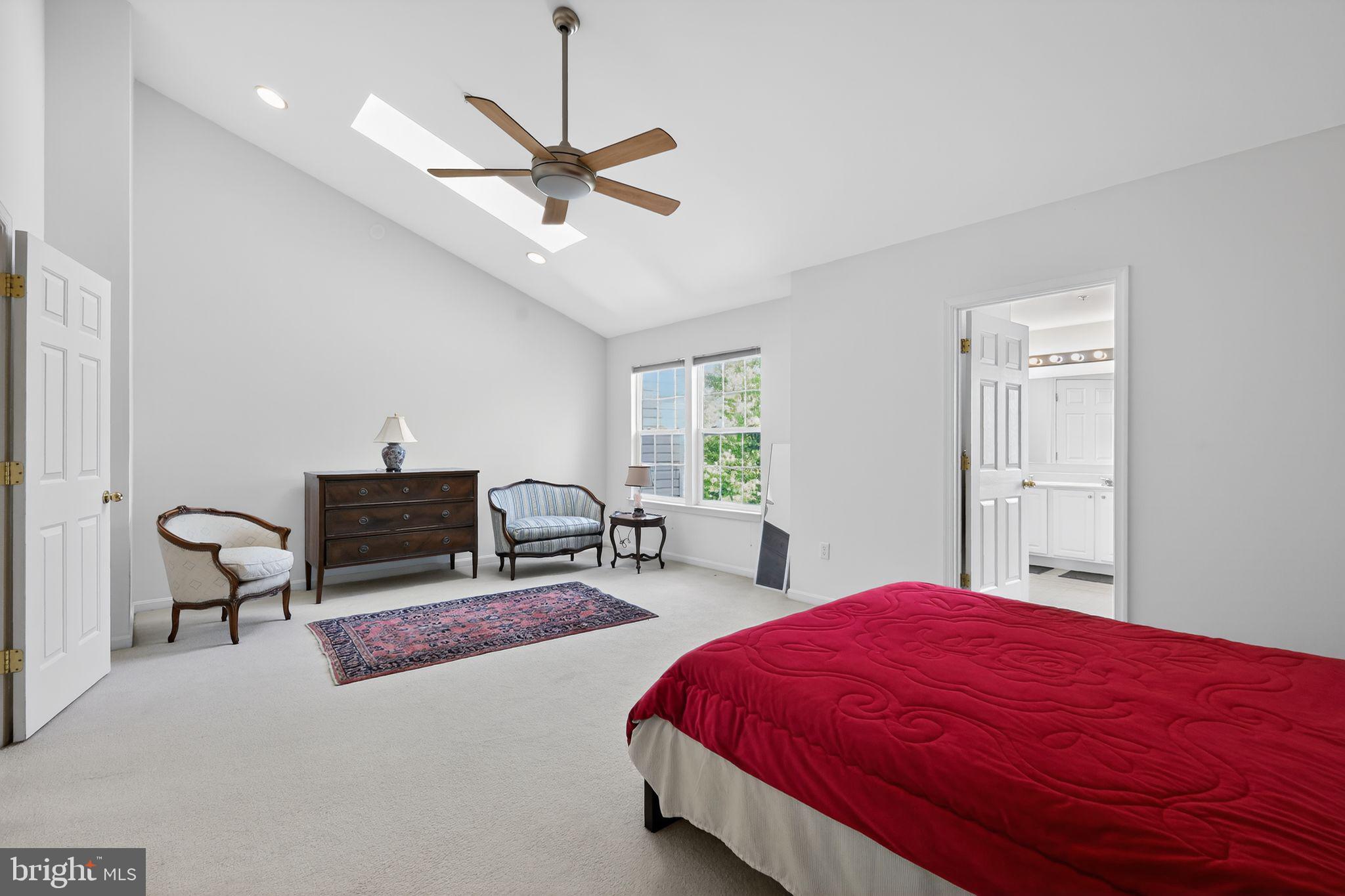 1034 Meandering Way Odenton, MD 21113 - Photo 21 of 30 a bed room with a bed and a chair