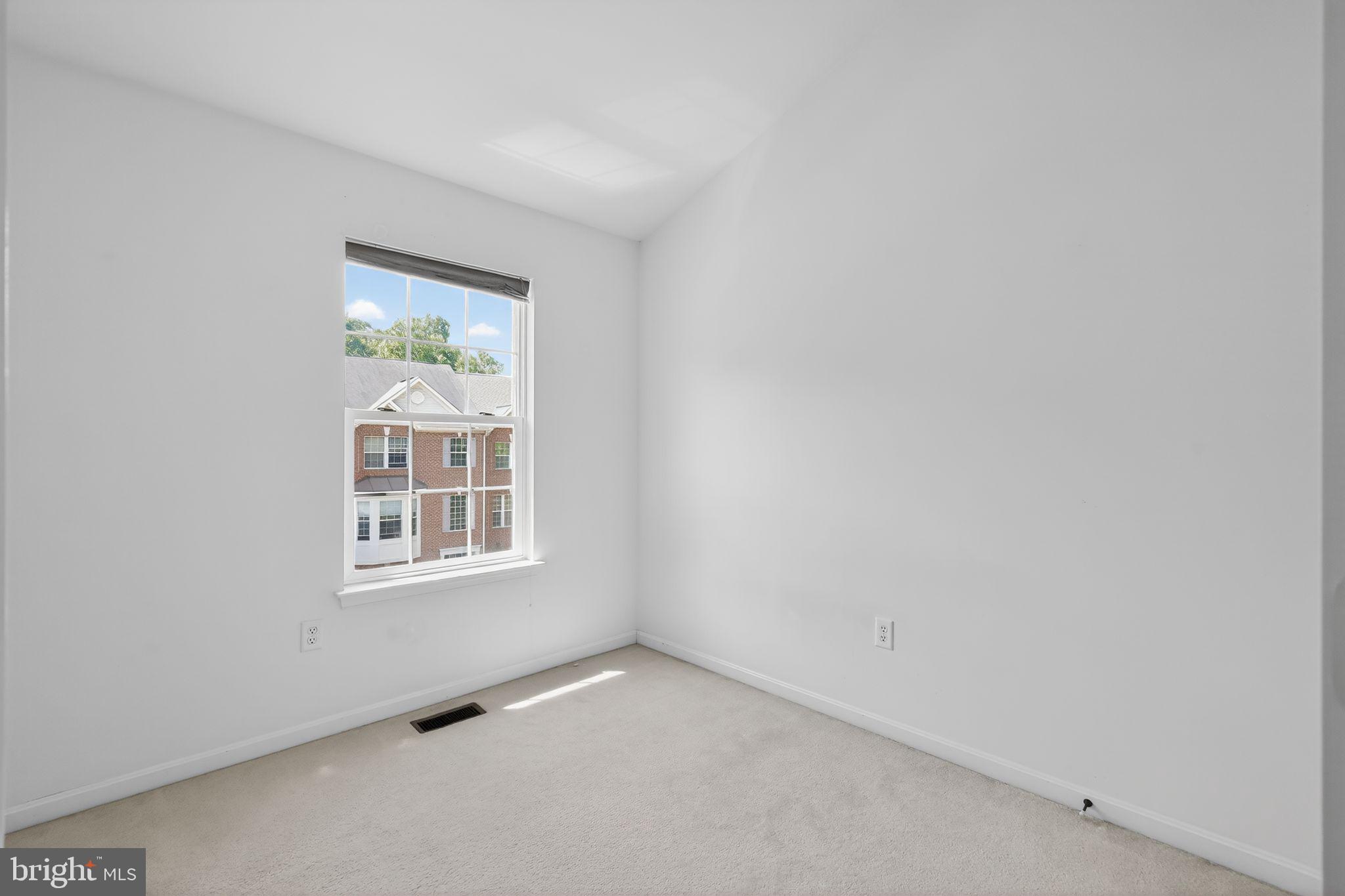 1034 Meandering Way Odenton, MD 21113 - Photo 28 of 30 an empty room with windows