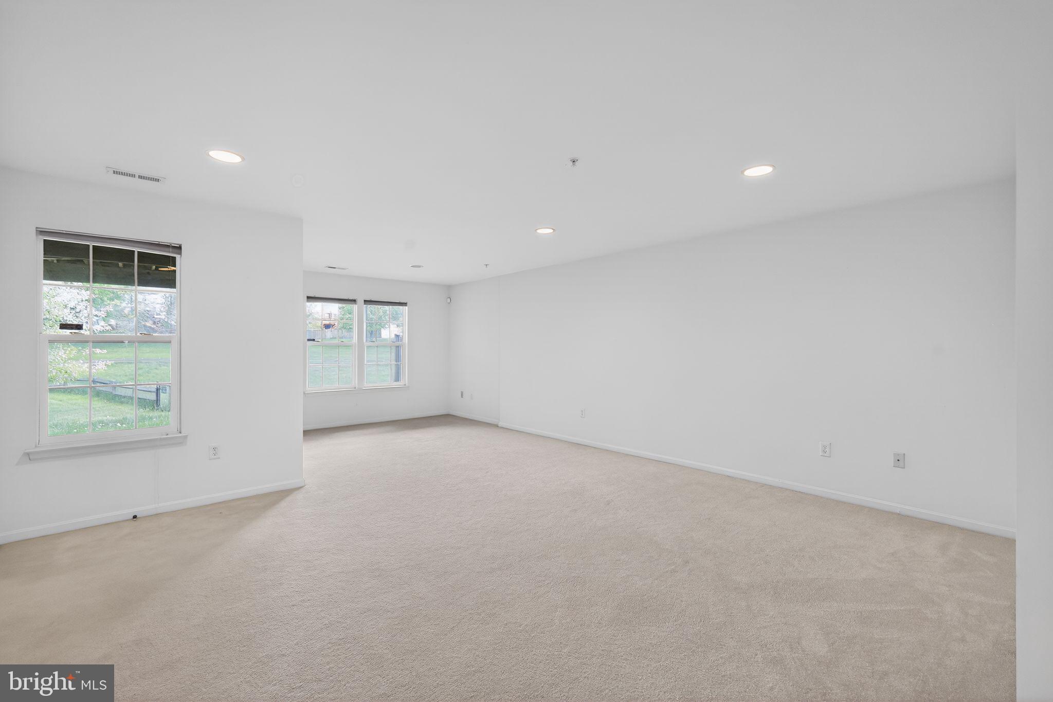 1034 Meandering Way Odenton, MD 21113 - Photo 6 of 30 an empty room with windows