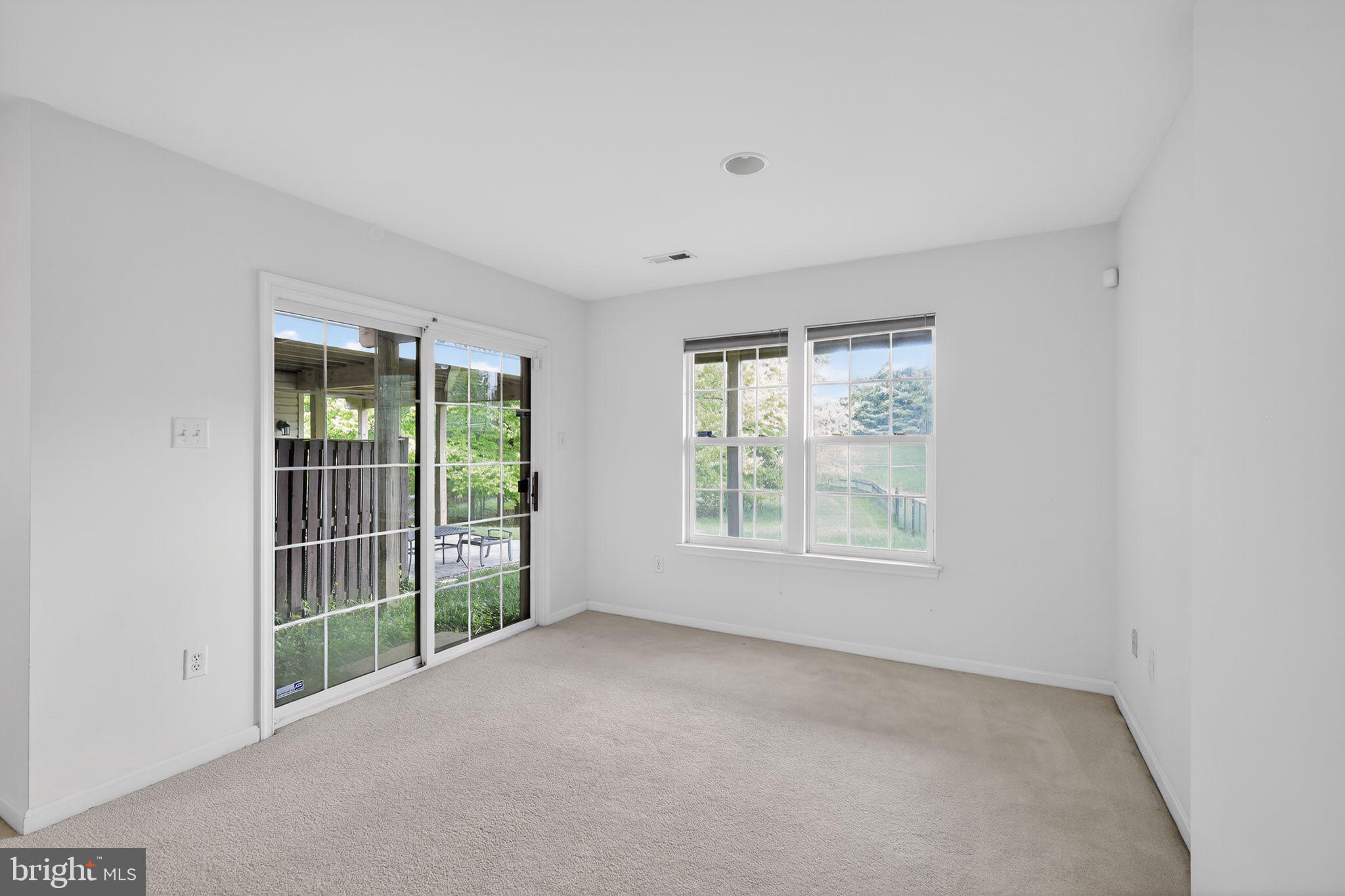 1034 Meandering Way Odenton, MD 21113 - Photo 7 of 30 an empty room with windows
