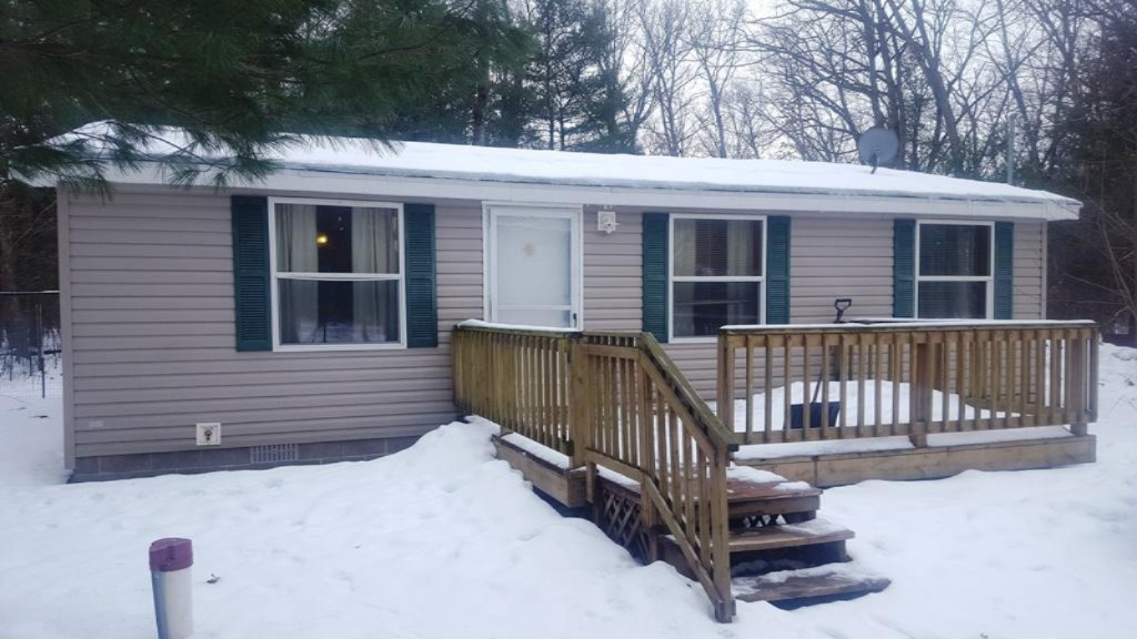 20475 Gates Road Howard City, MI 49329 - Photo 1 of 16 Front of home