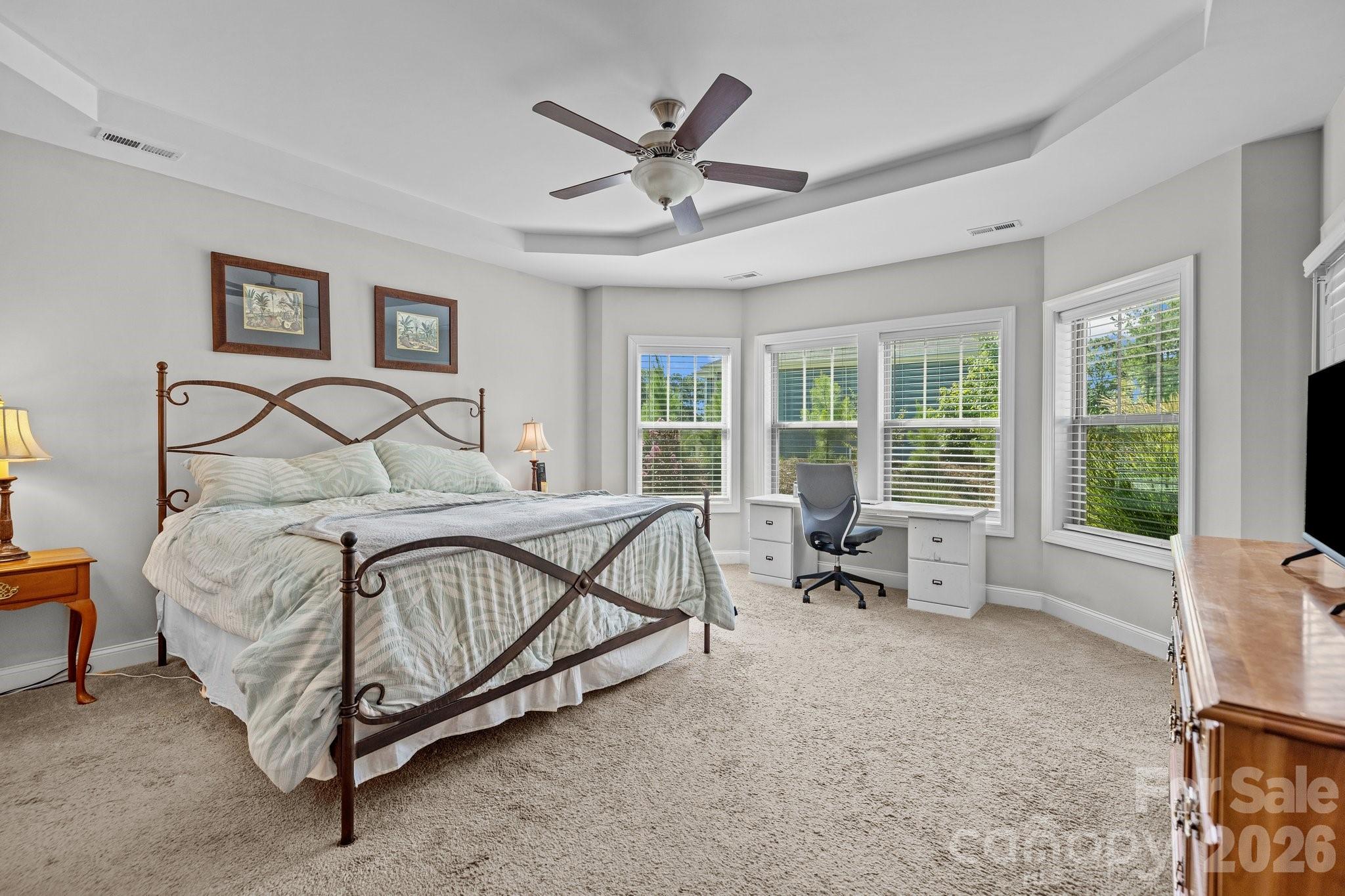 4697 Rinaldo Road York, SC 29745 - Photo 13 of 37 a bedroom with a bed a couch and a large window