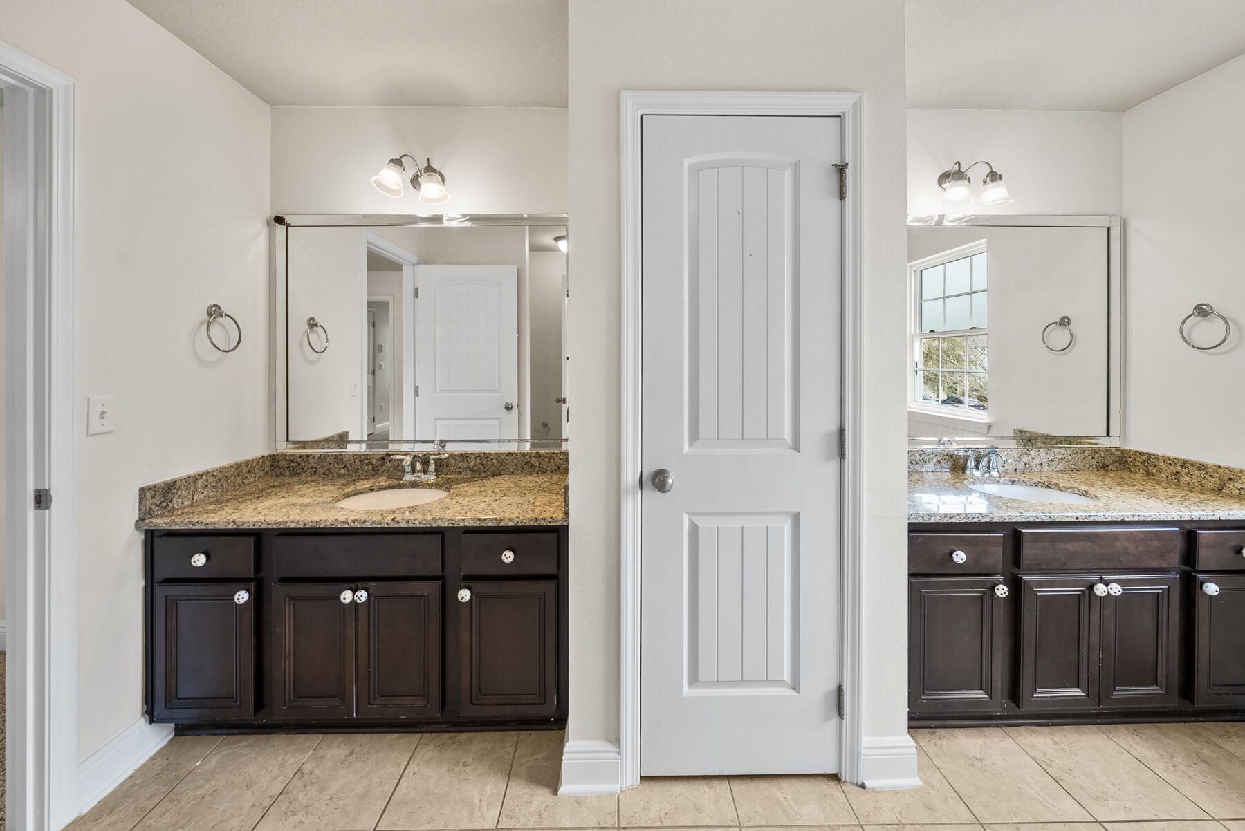 41 Hackberry Way Santa Rosa Beach, FL 32459 - Photo 12 of 27 a bathroom with a granite countertop sink a mirror and a vanity
