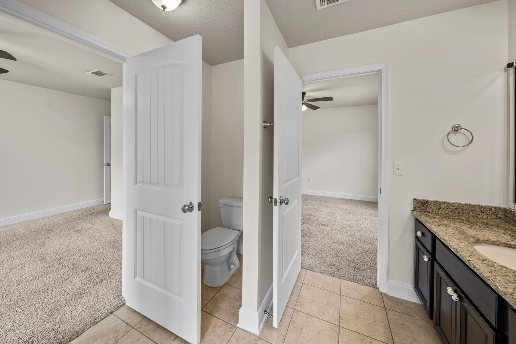 41 Hackberry Way Santa Rosa Beach, FL 32459 - Photo 14 of 27 a bathroom with a granite countertop sink and a washing machine