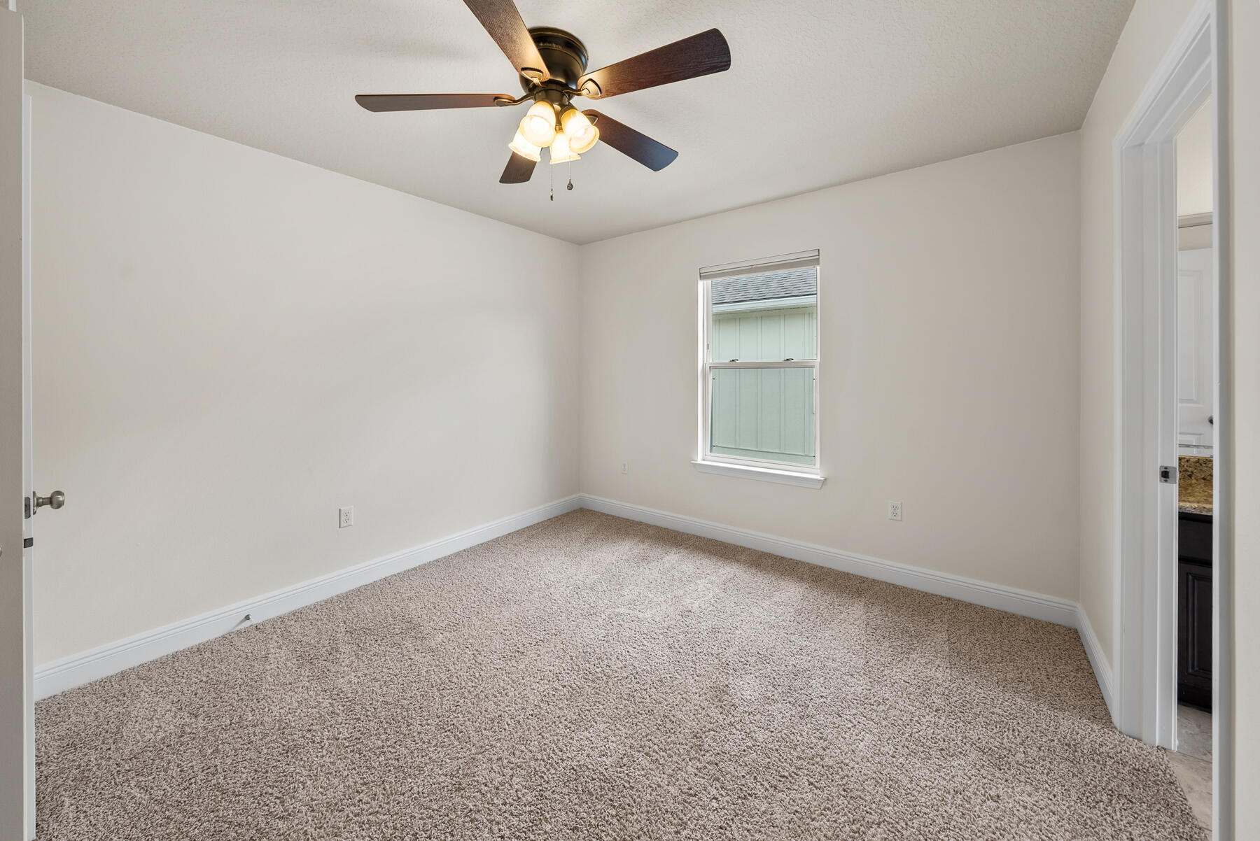 41 Hackberry Way Santa Rosa Beach, FL 32459 - Photo 15 of 27 an empty room with windows and fan