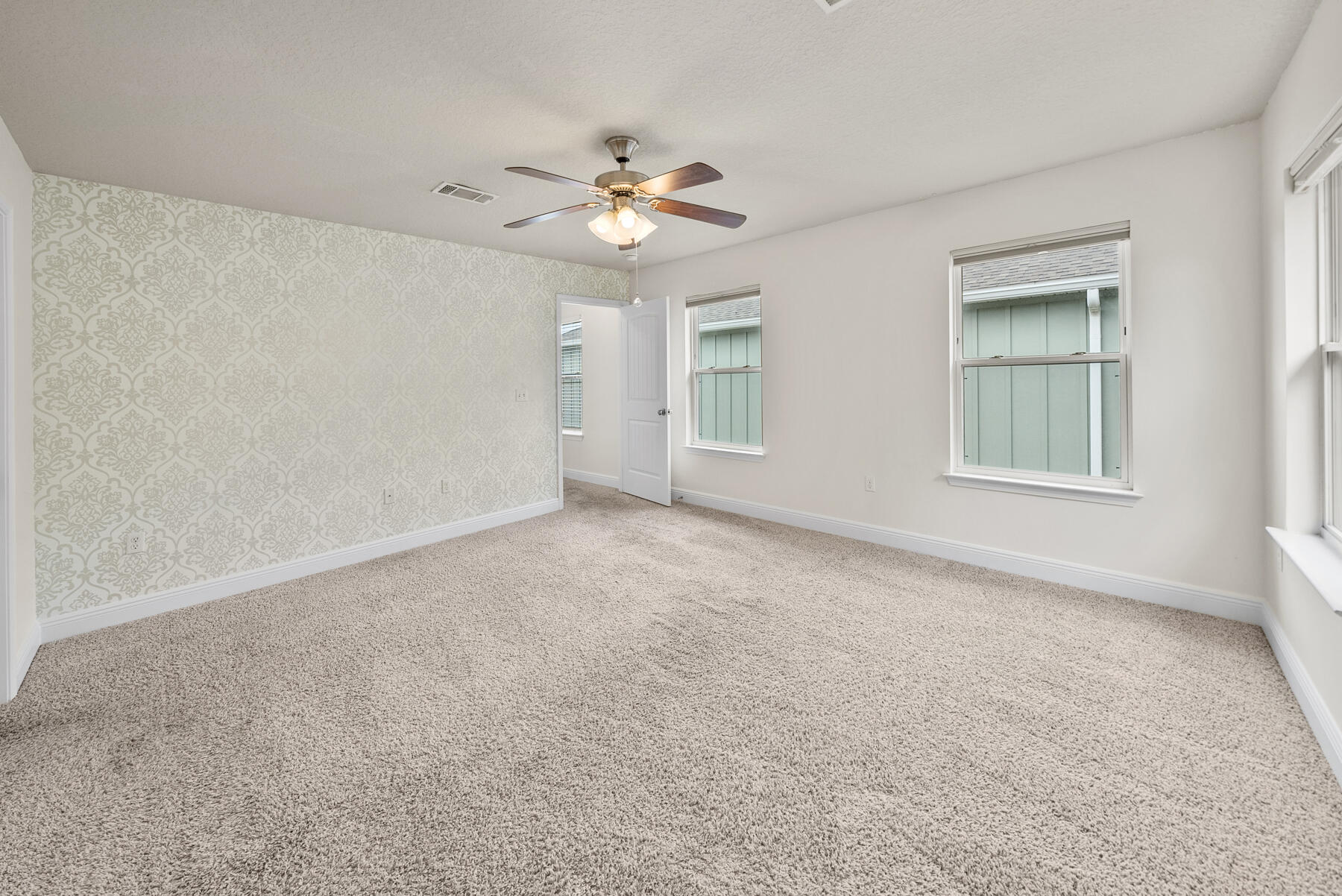 41 Hackberry Way Santa Rosa Beach, FL 32459 - Photo 7 of 27 a view of an empty room with a window