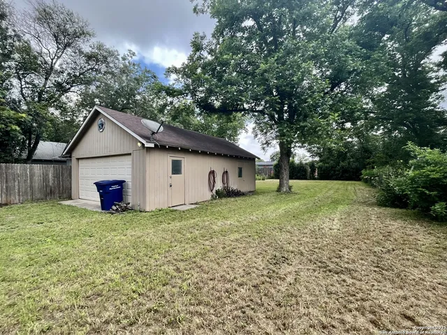 a picture of a bathroom with a shower