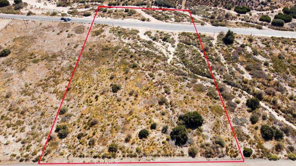 Red property boundary markers are not to be relied on as exact property lines. Buyer to confirm independently.