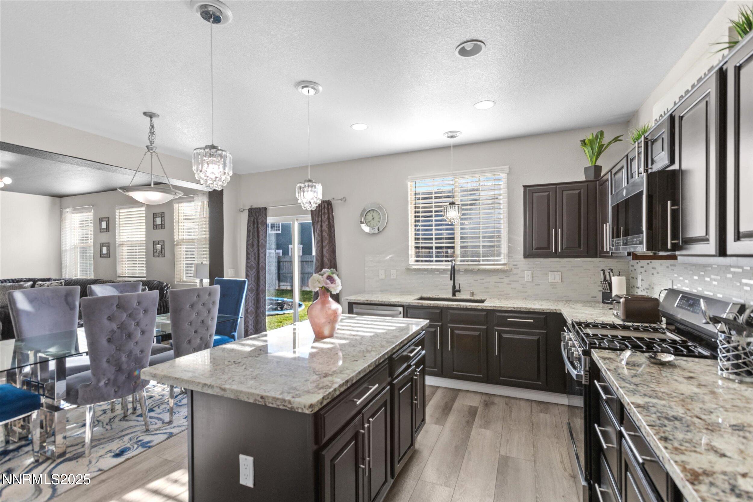 8922 Sorcha Street Reno, NV 89506 - Photo 17 of 47 a kitchen with lots of counter top space