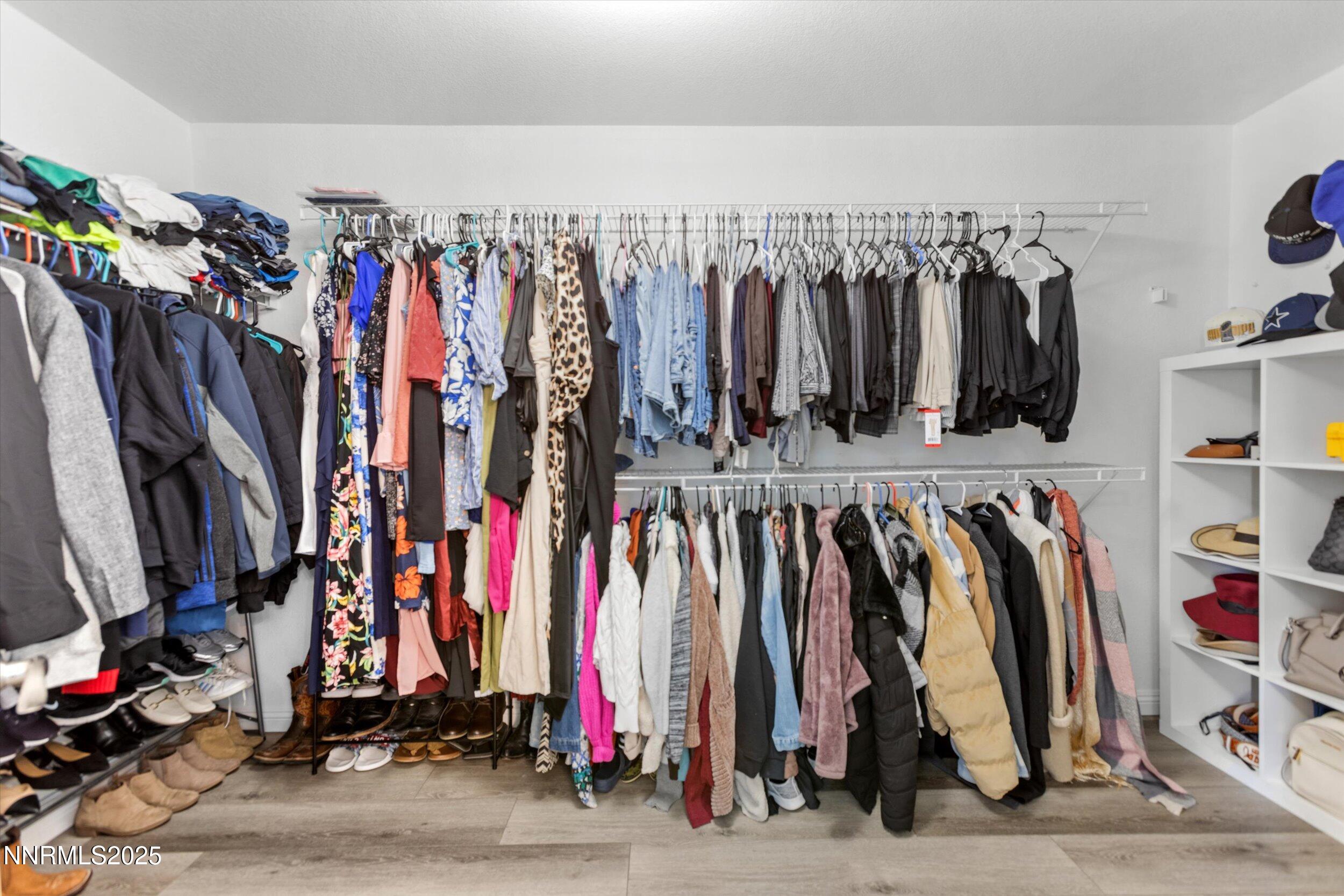 8922 Sorcha Street Reno, NV 89506 - Photo 32 of 47 a view of walk in closet with clothes