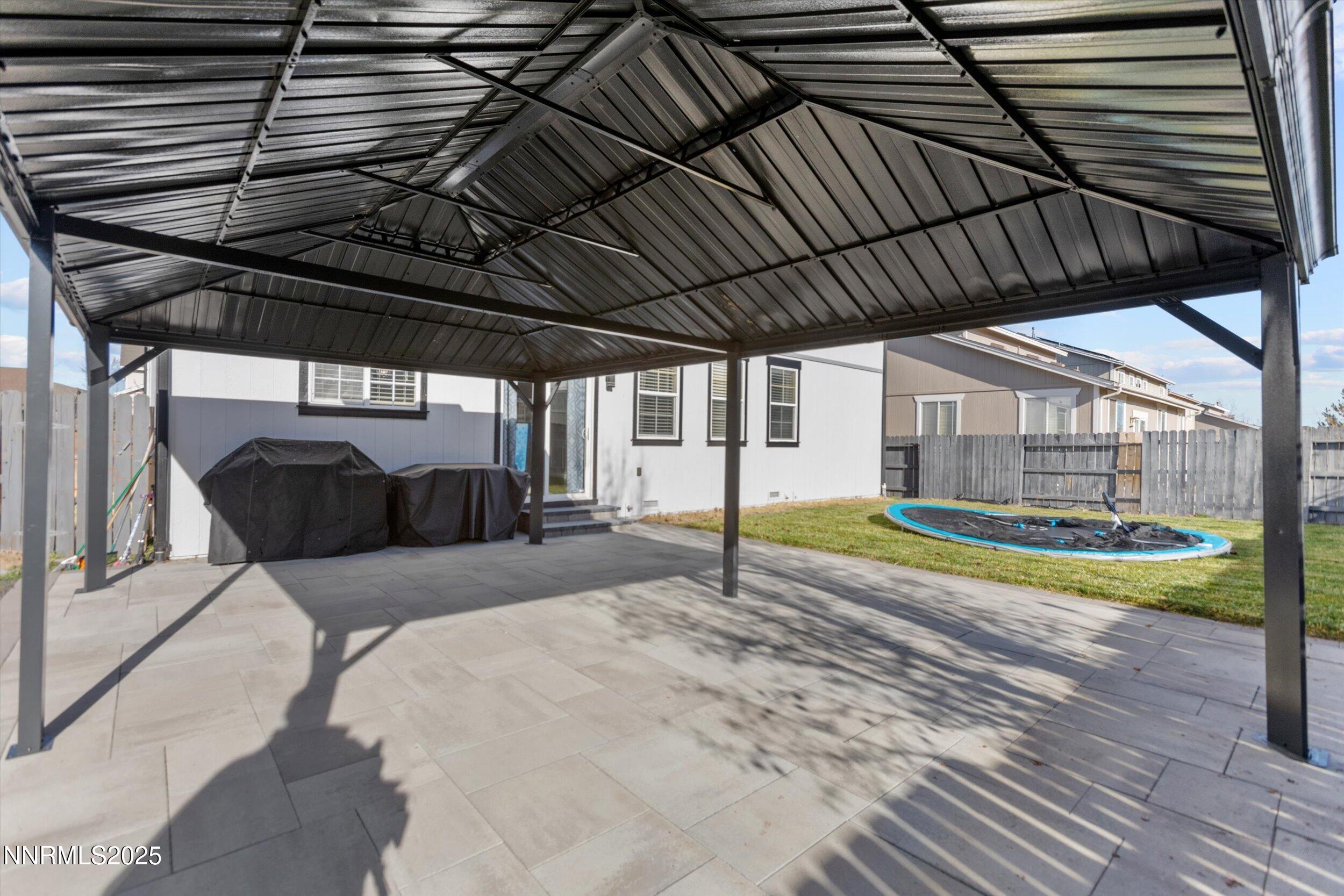 8922 Sorcha Street Reno, NV 89506 - Photo 42 of 47 a view of swimming pool with a patio