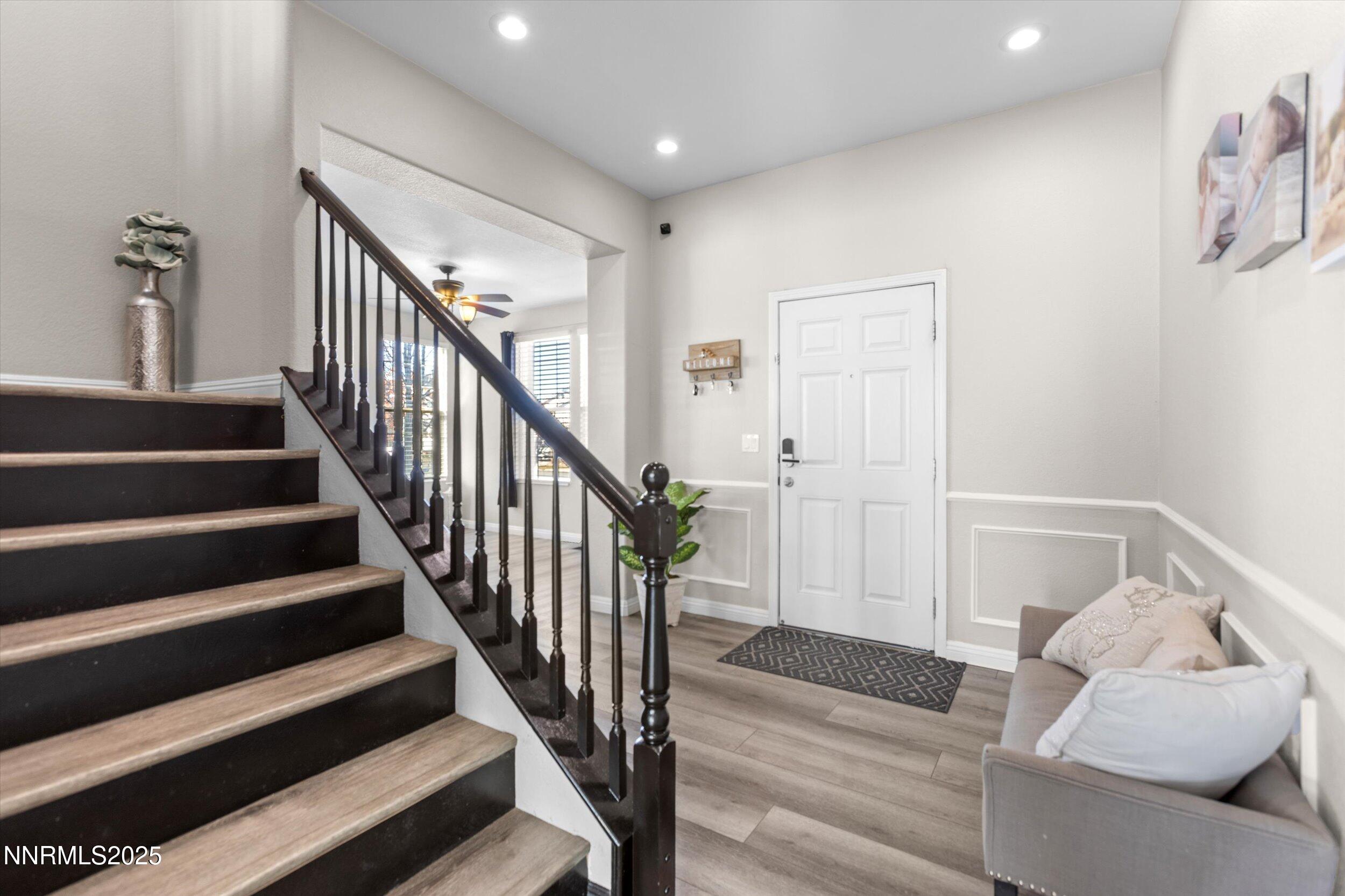 8922 Sorcha Street Reno, NV 89506 - Photo 6 of 47 a view of entryway and hall with wooden floor
